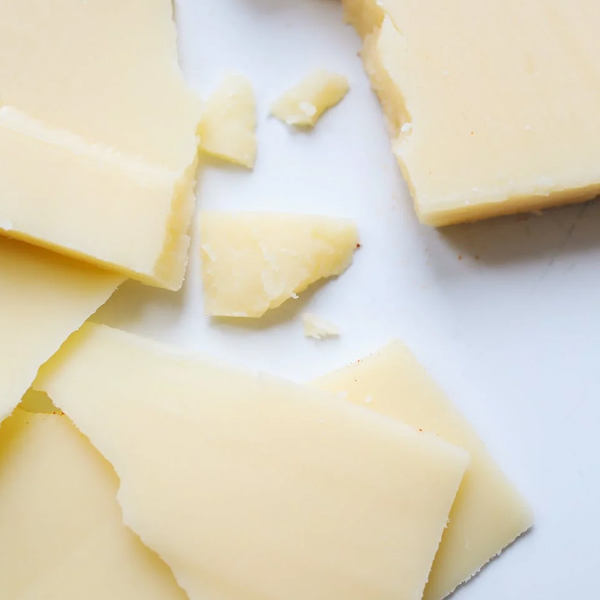 Can Dogs Eat Parmesan Cheese? And How Much Is Safe?